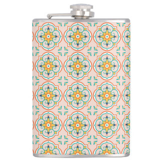 A metal flask with a colorful, symmetrical pattern fickplunta