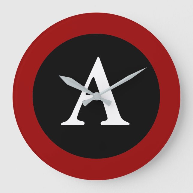 A: Monogram - en stor modern väggklocka (Framsida)
