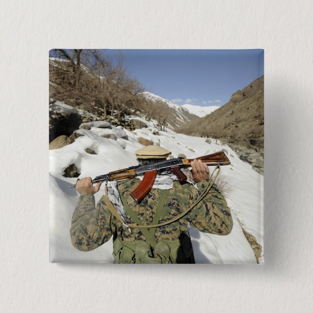 A Mujahadeen Guard går med USA:s militära memb Knapp (Framsida)