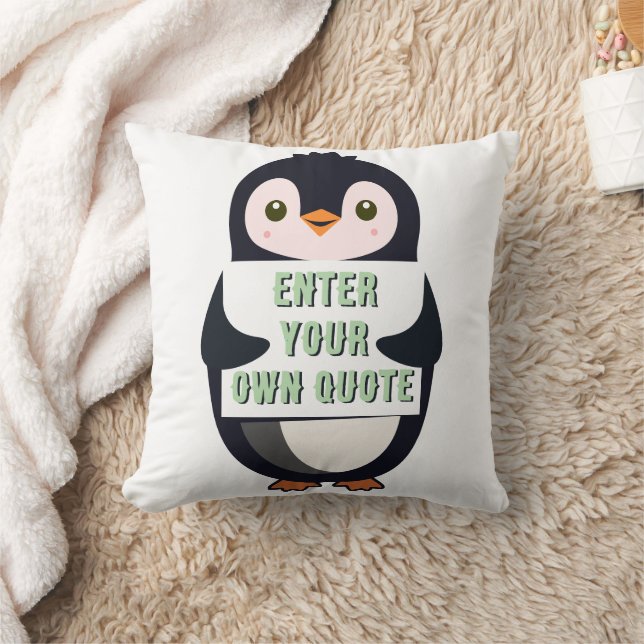 A penguin holding a sign with customizable text kudde (Filt)