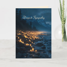 A sea of candlelights on the beach in the dark kort