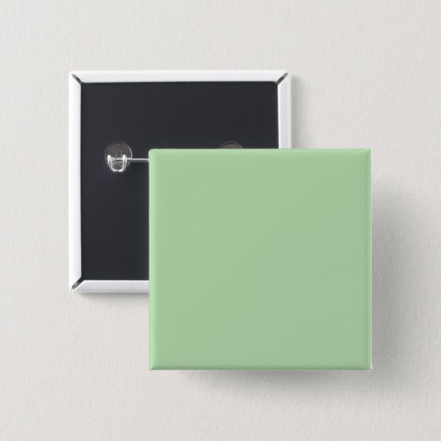 A soft pale green background fills the image knapp (Framsida & baksida)