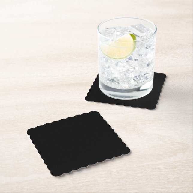 A solid black textured surface fills the entire underlägg papper (Insitu)