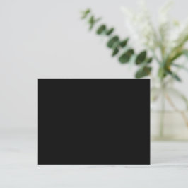 A solid black textured surface fills the entire vykort