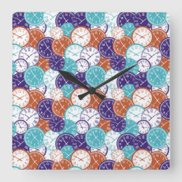 A square wall clock with overlapping clock faces  fyrkantig klocka