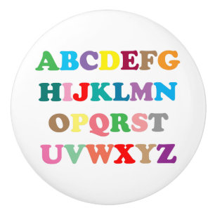 Abcs färgrika bokstäver knopp