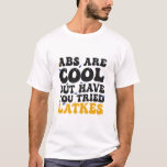 Abs är Coola, men har du provat Latkes Hanukkah? T Shirt<br><div class="desc">hanukkah, jewant, jew, menorah, dreidel, latkes, present, födelsedags, groovy, chanukah</div>
