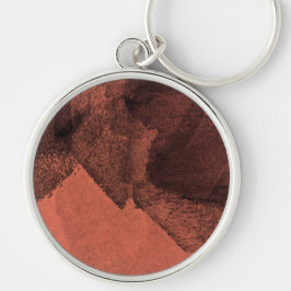 Abstrakt av röd gult som målar upp pensel-digitalk rund silverfärgad nyckelring
