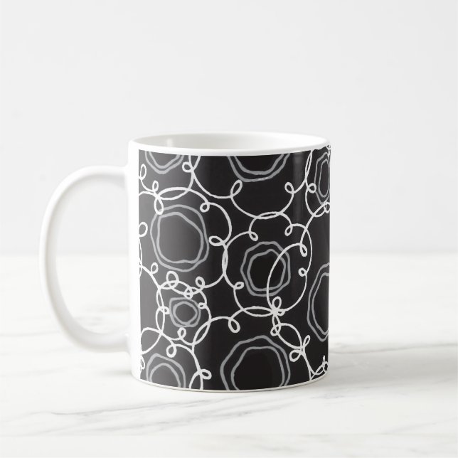 Abstrakt blommatrix (svart) finkonst kaffemugg (Vänster)