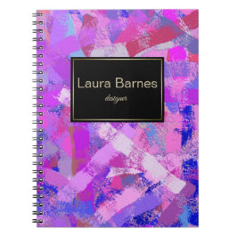 Abstrakt borstar slår den rosa violeten anteckningsbok med spiral