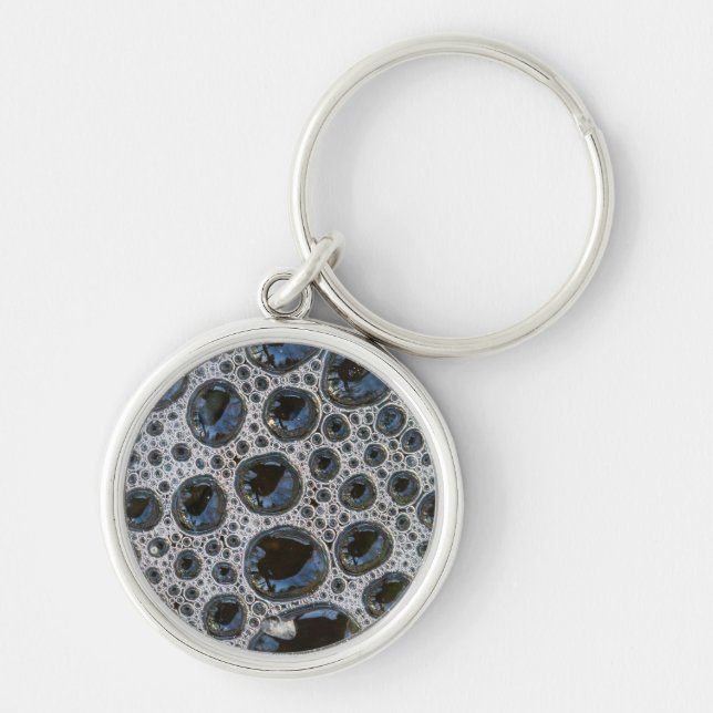 Abstrakt bubbelmönster rund silverfärgad nyckelring (Framsidan)
