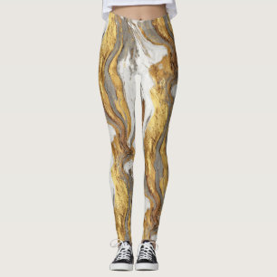 Abstrakt grå marmortextur med flödande guld leggings