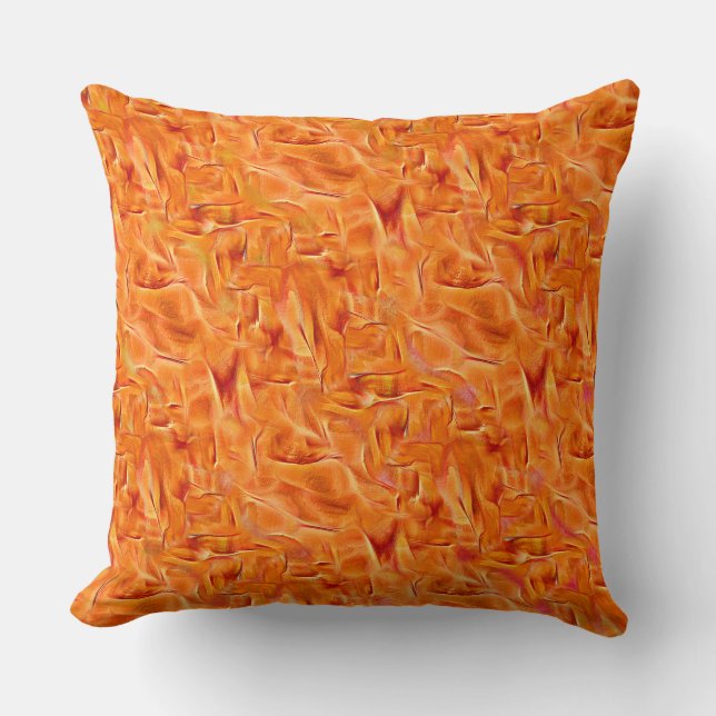 Abstrakt guldtamarin med korsat ben, orange kudde (Framsida)