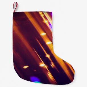Abstrakt julafton Guld-gnistor eller glitter ljus. Liten Julstrumpa