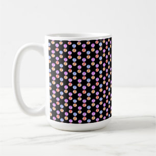 Abstrakt mångfärgad geometrisk form på svart kaffemugg