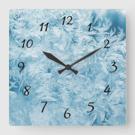 Abstrakt och snöflingor fyrkantig klocka