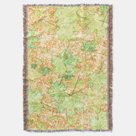 Abstrakt per löv på skrapad mark på beige filt