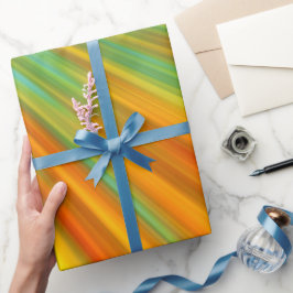 Abstrakt röd gult orange grönt rand på blå presentpapper