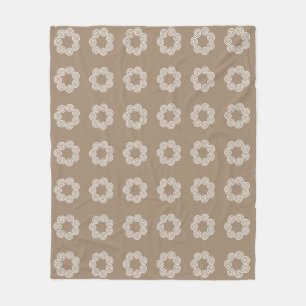 Abstrakt spiral cirkelmönster på lyckosam beige fleecefilt