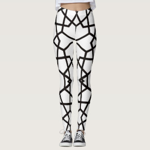 Abstrakt svart linjer mönster på pristinvit leggings