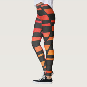 Abstrakta solnedgångsrandiga med djärva geometrisk leggings