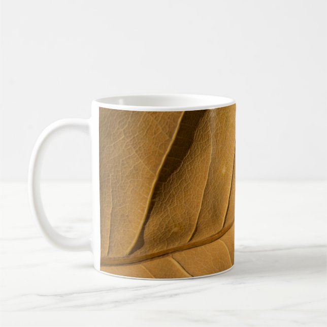 Abstraktens sluttorra grundbak för löv struktur kaffemugg (Vänster)