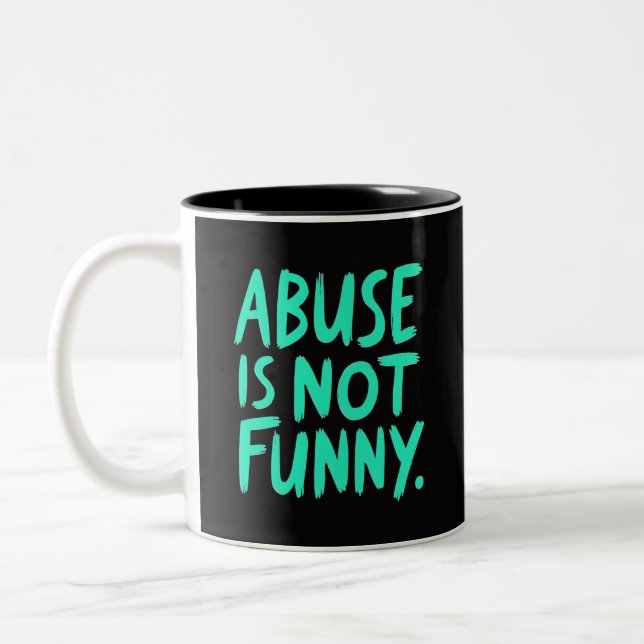 Abuse is not funny Två-Tonad mugg (Vänster)