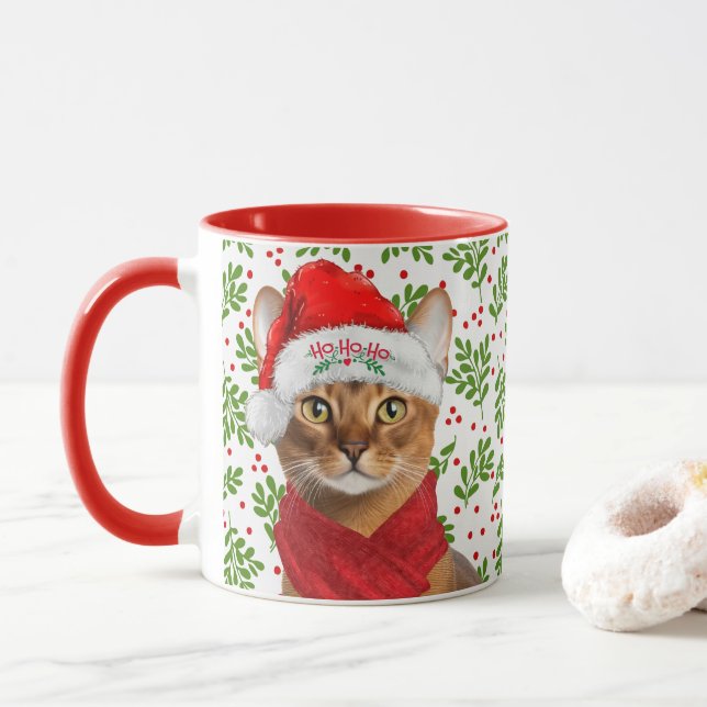 Abyssinsk katt i tomteluva med julholly mugg (Med munk)
