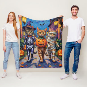 Abyssinska katter som går runt och bugar på Hallow Fleecefilt