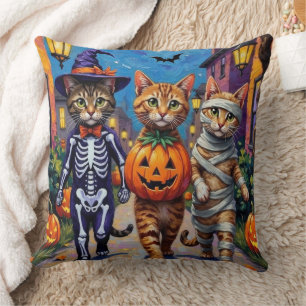 Abyssinska katter som söker godis på Halloween Kudde