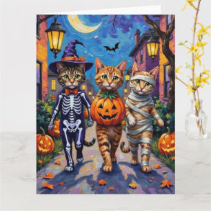 Abyssinska katter som trick-or-treatar i Halloween Kort