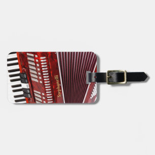 ACCORDIAN-MUSIKALEN INSTRUMENTERAR BAGAGEBRICKA