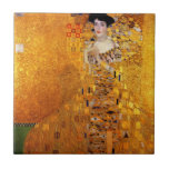Adele Bloch-Bauers Porträtt av Gustav Klimt Kakelplatta<br><div class="desc">Gustav Klimt - Adele Bloch-Bauer's Porträtt 1907. Föregående plats för den här målningen: Tidigare Österreichische Galerie i palatset Belvedere i Wien. Den här målningen såldes för 135 miljoner dollar till Ronald S. Lauder, 2006, som tog med det till sin Neue Galerie i New York City. Vid den tidpunkten var det...</div>