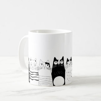 Adsible cat sitta kaffemugg