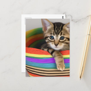Adsible Kitten i en färglös Basket Vykort