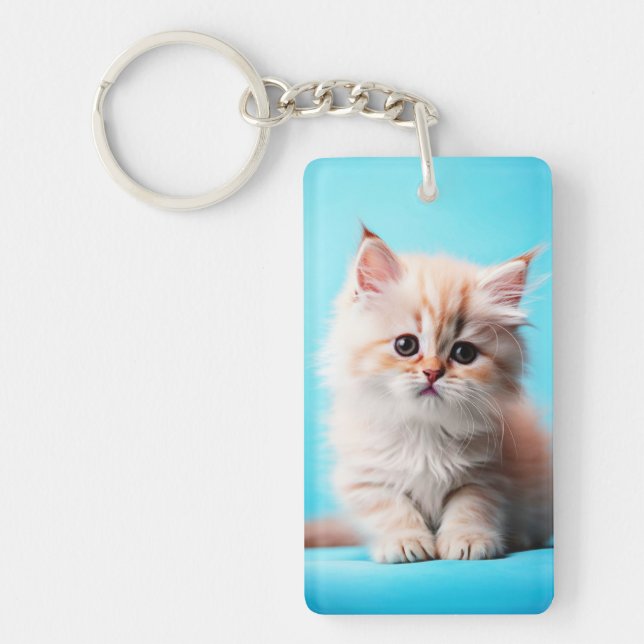 Adsible Kitten med blå bakgrund Nyckelring (Framsidan)