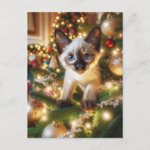 Adsible Siamese Kitten i en Julgran Vykort