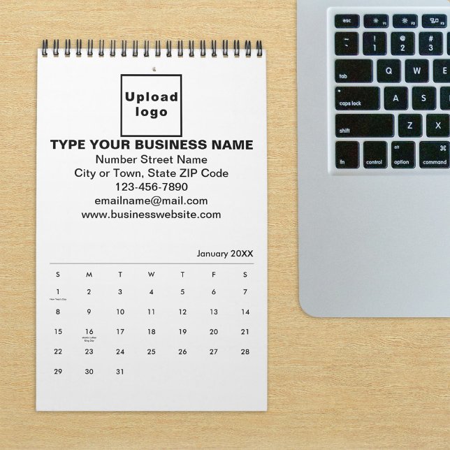 Affärsgren i kalendern kalender (Build brand name awareness. Your business brand on calendar displayed on office desk.)