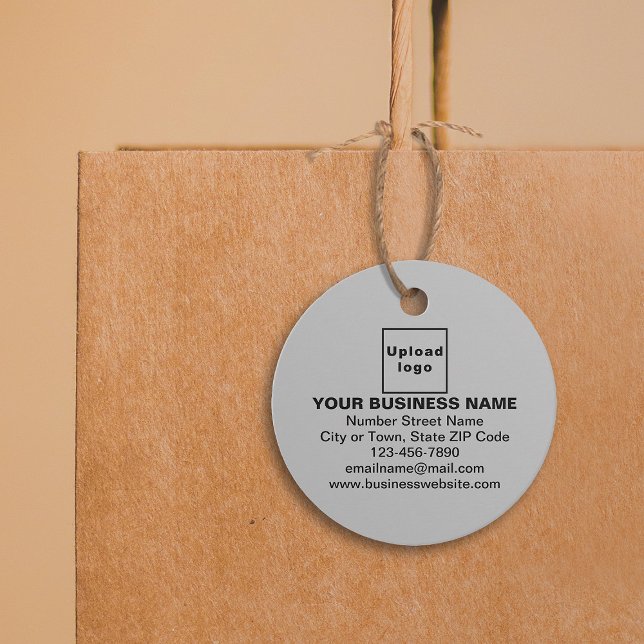 Affärsgren på Grått Circle Märkre Gåvor Etiketter (Gray color round shape tag with your business brand attached on shopping bag.)