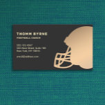 Affärskortet Football Coach Visitkort<br><div class="desc">Guld-logotypen för hjälmet silhouette Om du vill ha mer matchande material från marknadsföring kan du kontakta mig på maurareed.designs@gmail.com. Om du vill ha mer fördefinierade logotyper går du till logoevolution.co. Ursprunglig design av Maura Reed.</div>