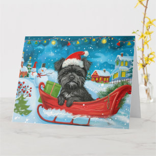 Affenpinscher i släde snö jul kort