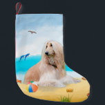 Afghan Hound Hund on Beach Liten Julstrumpa<br><div class="desc">En afghan hound sitta på stranden är en perfekt gåva till någon som kärlek i hund aveln.</div>