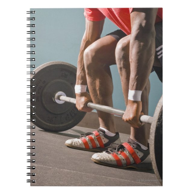 Afrikansk amerikan som arbetar på gymmet anteckningsbok (Framsidan)