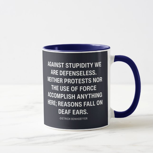 Against Stupidity We Are Defenseless  Mugg (Höger)