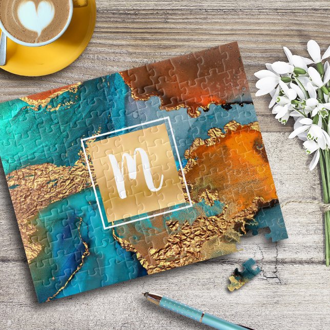 Agera vattenfärgsmonogram guld-turkos-orange pussel (Skapare uppladdad)