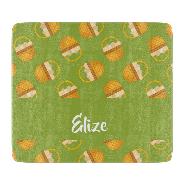 Ägg i bruna basket på grönt (Framsidan)