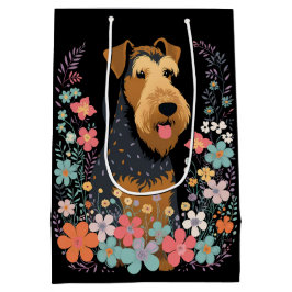 Airedale Terrier-Hund i Blomsterträdgård Cute