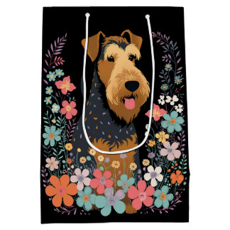 Airedale Terrier-Hund i Blomsterträdgård Cute
