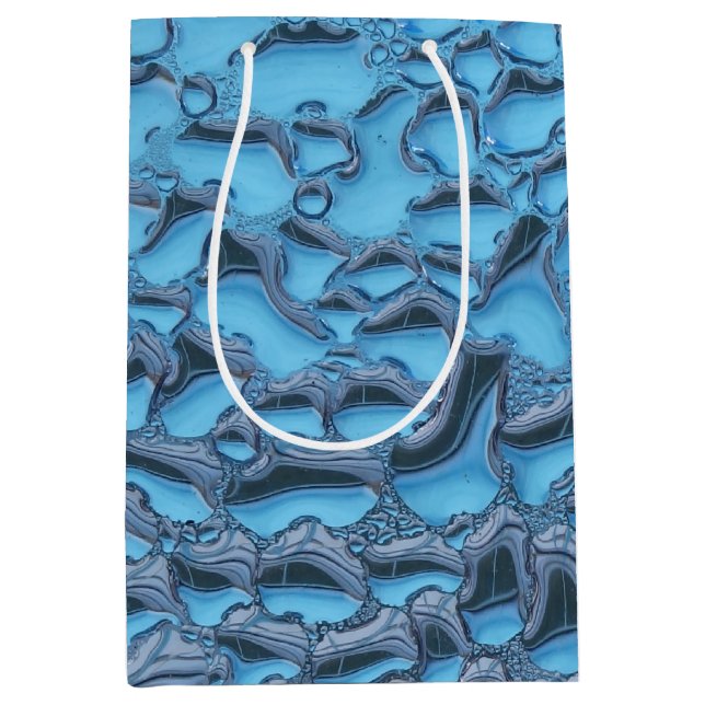 Äkta regndroppar på blått glas (Framsidan)