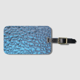 Äkta regndroppar på blått glas bagagebricka